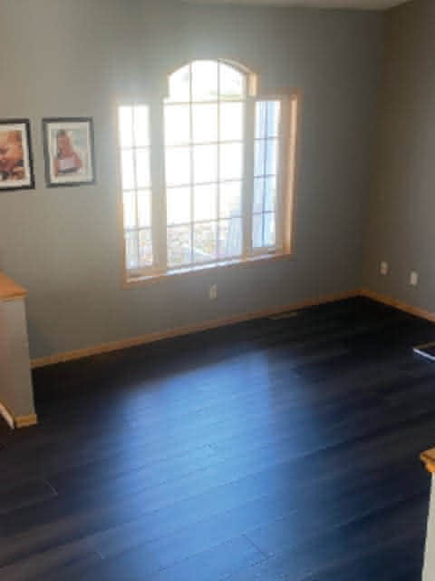 A living room with white walls