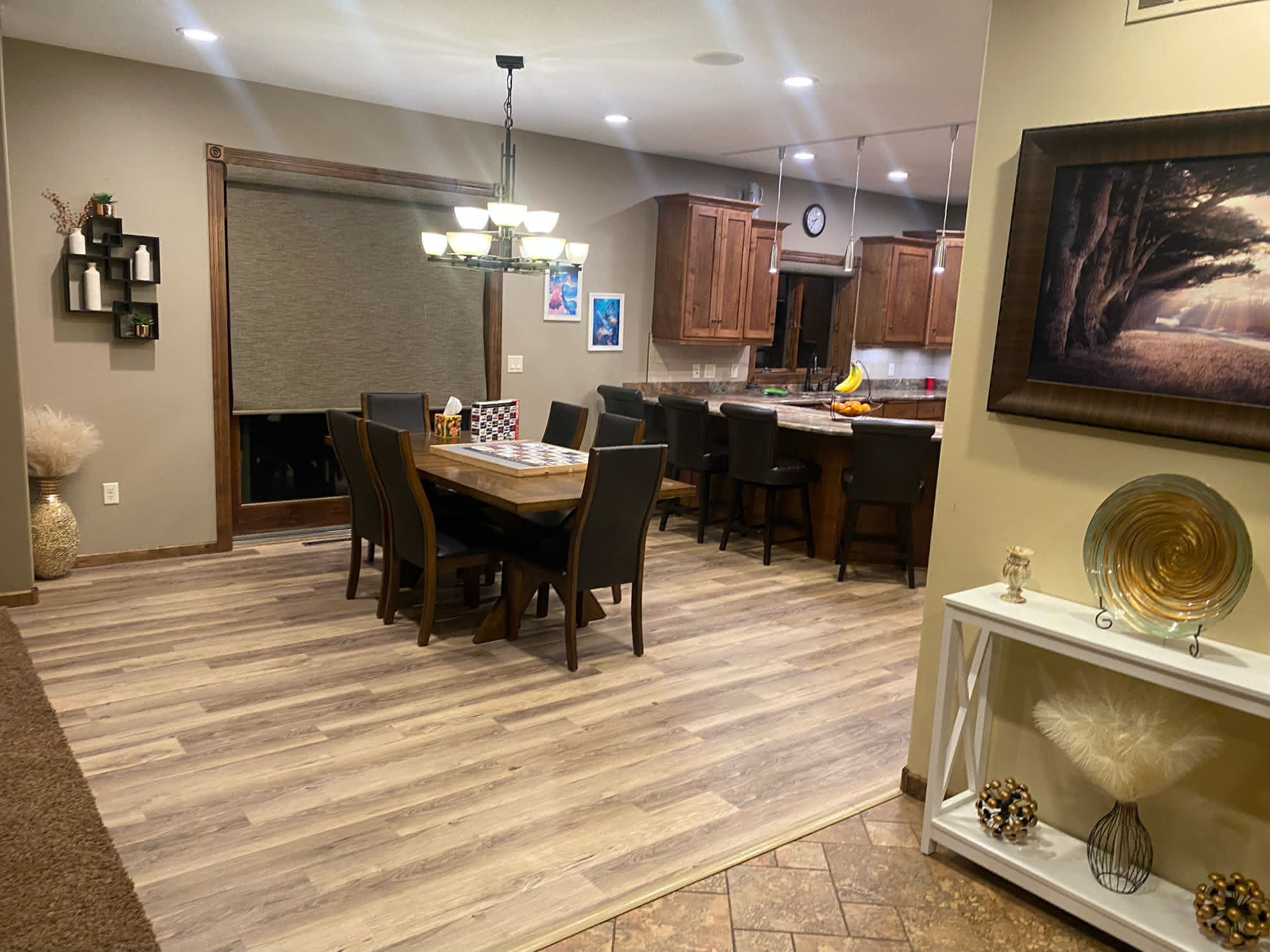 A dining room with a wood floor